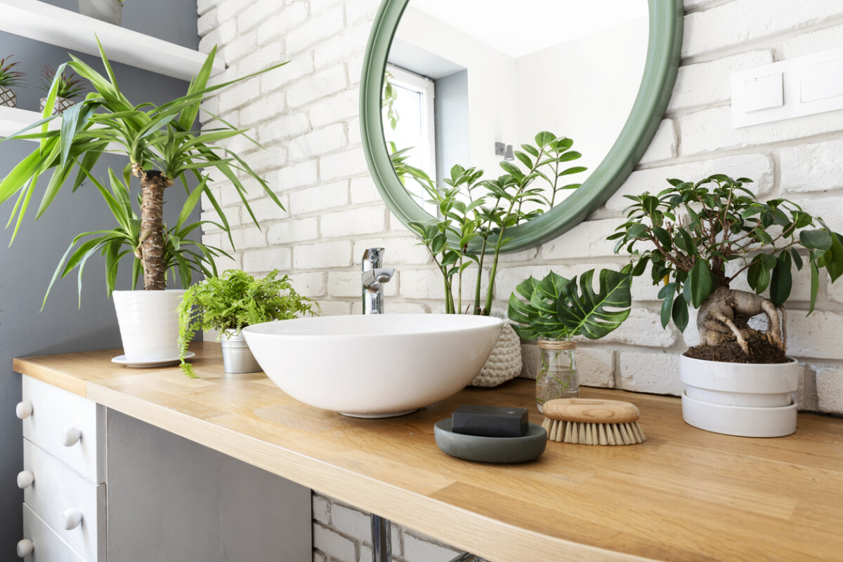 Modern Scandinavian-style bathroom with minimalist decor, light wood accents, and a loft design.